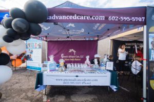 A tent with balloons and other items on it.