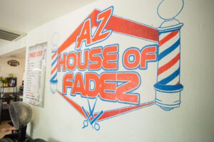 A picture of the inside of a barber shop.