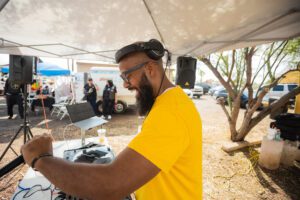 A man with a beard and headphones on