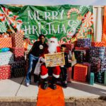 A person sitting in front of santa clause