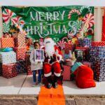 A person in santa claus costume posing for a picture.