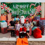 A group of children posing with santa claus.