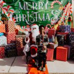 A person in santa costume posing for the camera.