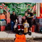 A family posing for a picture with santa.